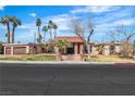 Charming home featuring a two-car garage, complemented by lush landscaping and a neatly manicured lawn at 1409 Bonita Ave, Las Vegas, NV 89104