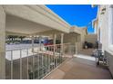 Covered carport area with small table and chairs with views of desert landscape at 2194 Camel Mesa Dr, Laughlin, NV 89029