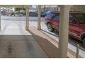 View of the carport with covered parking, side patio, and walkway at 2194 Camel Mesa Dr, Laughlin, NV 89029