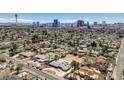 Wide aerial shot overlooking neighborhood with city skyline in background at 2711 Ashby Ave, Las Vegas, NV 89102