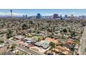 Expansive aerial shot of home's neighborhood and the Las Vegas skyline at 2711 Ashby Ave, Las Vegas, NV 89102