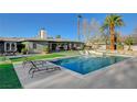 Sparkling pool and lounge area offer a refreshing oasis for relaxation and outdoor enjoyment at 2711 Ashby Ave, Las Vegas, NV 89102