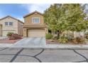 Charming two-story home with a well-maintained lawn and a two-car garage at 4446 Scarlet Sea Ave, North Las Vegas, NV 89031