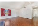 Bright living room with wood flooring and natural light at 6731 Fallona Ave, Las Vegas, NV 89156