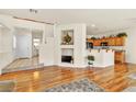 Bright living room with hardwood floors, open layout, and staircase at 225 Priority Point St, Henderson, NV 89012