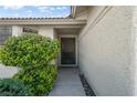 Close-up of the front entrance featuring desert landscaping and an inviting doorway at 6217 Sadler Dr, Las Vegas, NV 89130