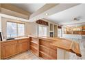 Entertainment space showcases a home bar with sink, custom millwork, and stylish lighting at 7623 Calm Passage Ct, Las Vegas, NV 89139