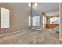 Bright and airy living room with neutral walls, carpeting, and abundant natural light at 7978 Light Tower St, Las Vegas, NV 89139