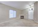 Spacious living room with fireplace and natural light at 3351 Indian Shadow St # 204, Las Vegas, NV 89129