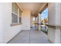 Inviting covered porch with elegant columns, offering a welcoming entrance to the home at 63 Crescent Palm Ct, Henderson, NV 89002