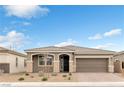 Beautiful single-story home with well-maintained landscaping and a two-car garage at 71 Gosia Grove Ave, North Las Vegas, NV 89031
