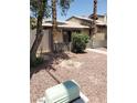 A modest one-story home with rock landscaping and low wooden fence at 4231 White Sands Ave, Las Vegas, NV 89121