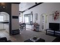 Bright living room with dining area featuring modern decor and an open floor plan at 10553 Pine Pointe Ave # 201, Las Vegas, NV 89144