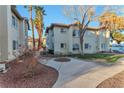 Well-maintained condo complex with a mix of drought-resistant landscaping and mature trees at 3408 Winterhaven St # 204, Las Vegas, NV 89108