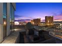 Spacious outdoor patio with lounge seating and panoramic city views at 360 E Desert Inn Rd # 1903, Las Vegas, NV 89109