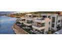 Waterfront homes offer stunning views, multiple balconies, private pools, and contemporary design at 42 Lakefront Dr, Henderson, NV 89011