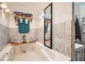 Relaxing bathroom with a luxurious soaking tub, perfect for unwinding after a long day at 4944 Rita Dr, Las Vegas, NV 89121
