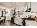 A spacious kitchen with stainless steel appliances and plenty of counter space for meal preparation at 4944 Rita Dr, Las Vegas, NV 89121