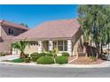 Beautiful single-story home with manicured landscaping, mature trees, and a spacious two-car garage at 5350 Tulip Hill Ave, Las Vegas, NV 89141