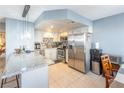 Modern kitchen with stainless steel appliances, granite countertops, and ample cabinet space at 929 Sulphur Springs Ln # 102, Las Vegas, NV 89128
