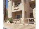 Exterior of building with block wall and railings with small patio at 2200 Highpointe Dr # 201, Laughlin, NV 89029