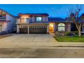 Charming two-story home with a three-car garage, balcony and tile roof in a well-maintained neighborhood at 2813 Via Avanti St, Henderson, NV 89074