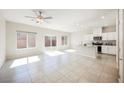 Bright living room with tile flooring, recessed lighting and access to the backyard at 3747 Lambent Ave, North Las Vegas, NV 89084