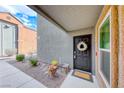 Welcoming front entrance with stylish door decor and a charming patio area at 555 E Silverado Ranch Blvd # 1025, Las Vegas, NV 89183