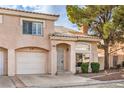 Charming two-story home with tile roof, desert landscaping, and attached one car garage at 8469 Sewards Bluff Ave, Las Vegas, NV 89129