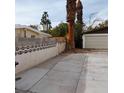 Backyard featuring a long driveway and detached garage at 1413 Bryn Mawr Ave, Las Vegas, NV 89102