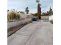 Long driveway leading to a detached garage in the backyard at 1413 Bryn Mawr Ave, Las Vegas, NV 89102
