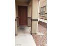 A solid front door with a classic design, offering a warm welcome at 167 Desert Pond Ave, Henderson, NV 89002