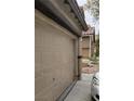 A side view of the attached two-car garage, part of the home's exterior at 167 Desert Pond Ave, Henderson, NV 89002
