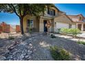 Charming two-story home with well-maintained front yard landscaping and a two-car garage at 2305 Dalton Ridge Ct, North Las Vegas, NV 89031