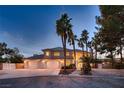 Spacious home with a three car garage and beautiful curb appeal at 3235 S Tioga Way, Las Vegas, NV 89117