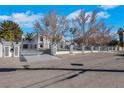 Elegant gated entrance to property ensuring privacy at 3860 Hildebrand Ln, Las Vegas, NV 89121