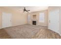 Inviting living room with lots of natural light and a cozy fireplace at 5855 Valley Dr # 1107, North Las Vegas, NV 89031