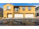 Three-car garage with potential for ample storage, a work area, and parking at 6134 Pine Villa Ave # 103, Las Vegas, NV 89108