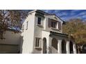 Charming two-story home with a stucco exterior and tile roof at 6541 Chinatown St, Las Vegas, NV 89166