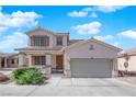 Charming two-story home featuring a spacious driveway and well-maintained front yard landscaping at 6817 Frances Celia Ave, Las Vegas, NV 89122