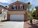 A charming two-story home with a two-car garage and well-maintained landscaping at 9937 La Paca Ave, Las Vegas, NV 89117