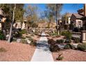 Landscaped street view featuring sidewalks and well-maintained yards at 11268 Corsica Mist Ave, Las Vegas, NV 89135