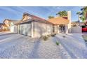 Charming single-story home with well-maintained gravel yard and attached two-car garage at 163 Spinnaker Dr, Henderson, NV 89015