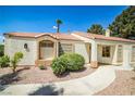 Inviting single-story home featuring a quaint walkway, well-maintained landscaping, and a cozy entrance at 2608 Port Of Call Dr, Las Vegas, NV 89128