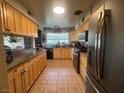 Kitchen with stainless steel appliances and wood cabinets at 4262 Tarkin Ave, Las Vegas, NV 89120