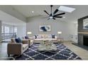 Bright living room with vaulted ceilings, fireplace and stylish decor at 5151 Tennis Ct, Las Vegas, NV 89120