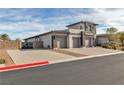 Spacious three-car garage and extensive driveway provide ample parking at 6130 Pebble Glen, Las Vegas, NV 89149