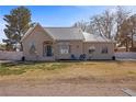 Charming single-story home featuring a unique metal roof and drought-resistant front yard at 1951 Jim Haworth Ct, Logandale, NV 89021