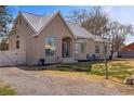 Charming single-story home featuring a unique metal roof and drought-resistant front yard at 1951 Jim Haworth Ct, Logandale, NV 89021