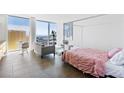 Stylish bedroom with a four poster bed and expansive city views at 3722 Las Vegas Blvd # 2204, Las Vegas, NV 89158